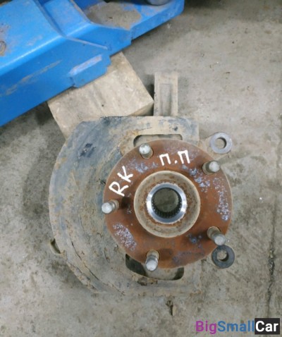 Кулак поворотный правый рено колеос